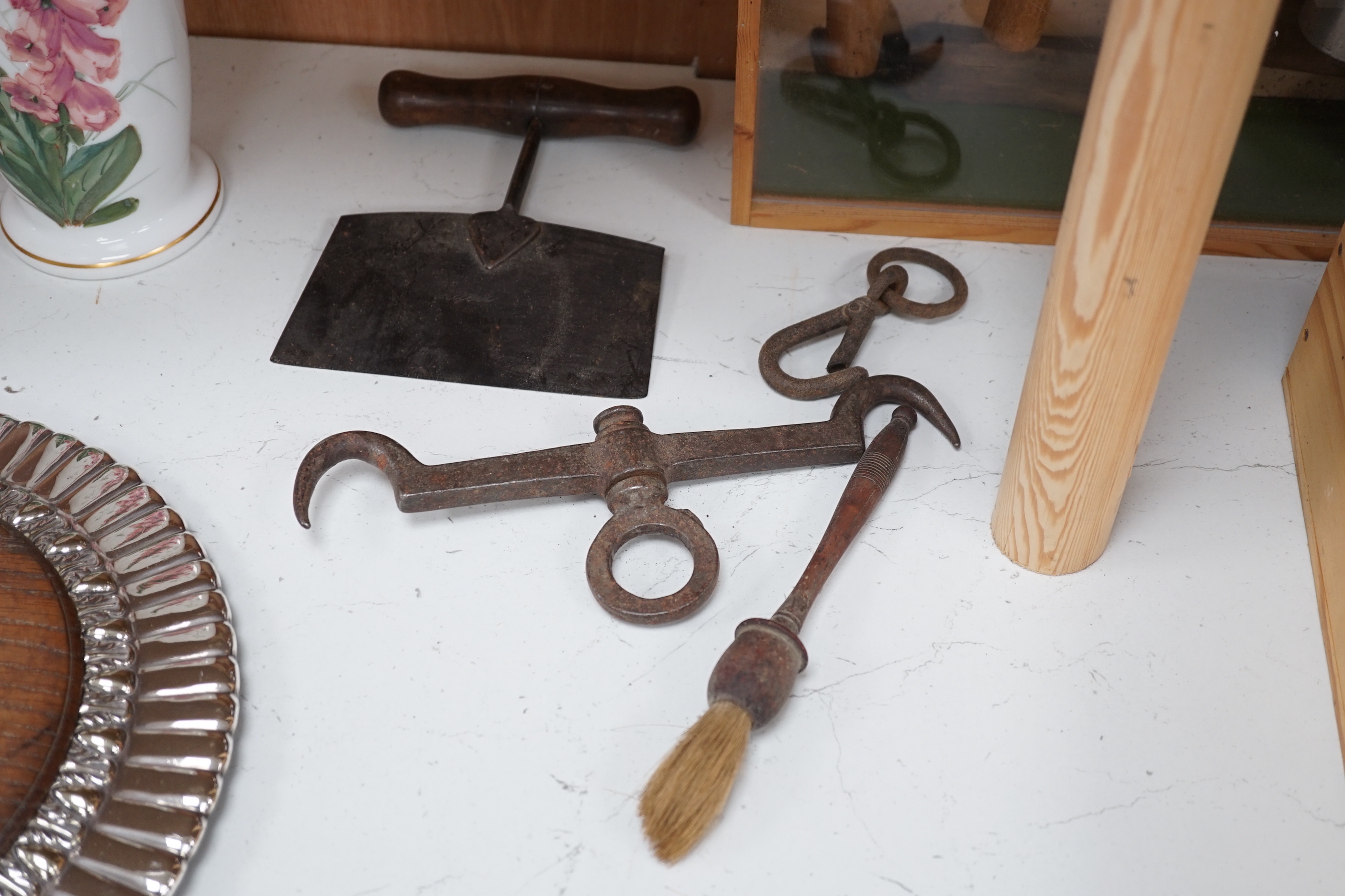 An assorted collection of used 20th century horticultural, shoe making and cooking tools